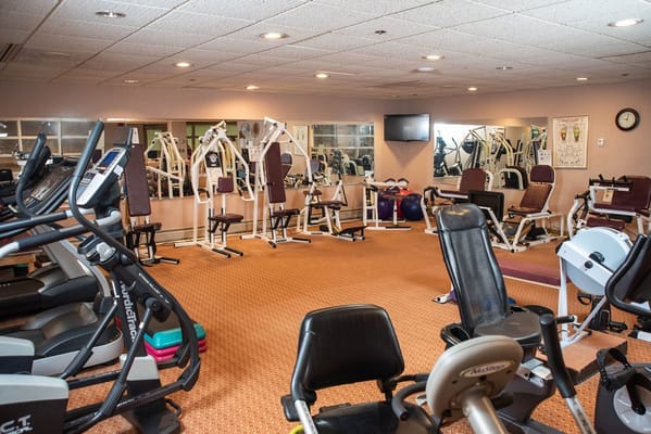 Fitness area with exercise equipment at Hampton Suites