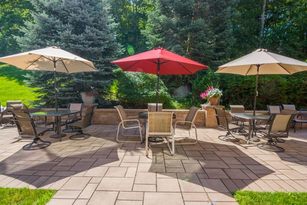 Outdoor patio with tables and umbrellas