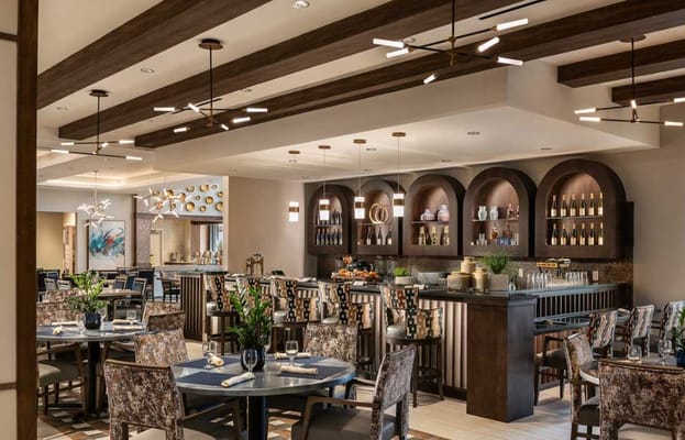 Modern dining area with elegant decor and seating