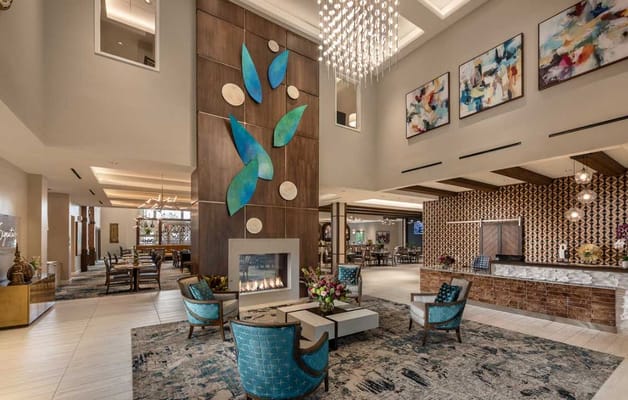 Stylish common area with seating and chandelier
