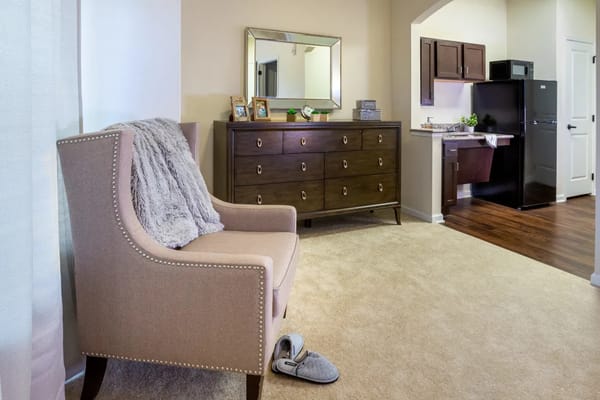 Cozy interior space with an armchair and dresser