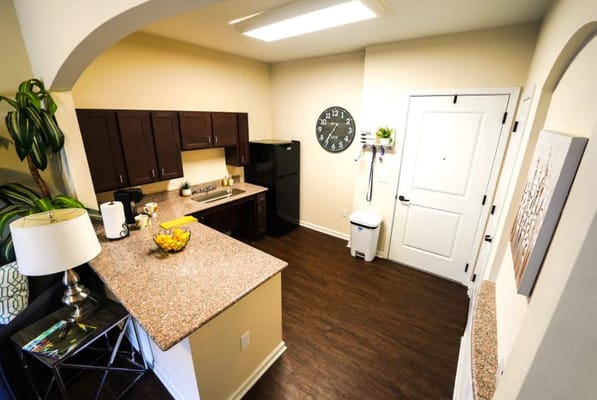 Inside view of a resident kitchen with modern amenities