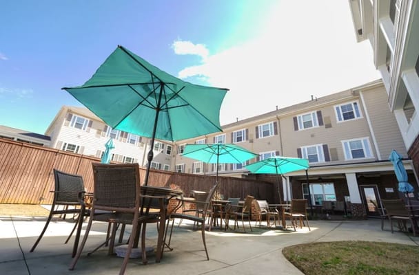 Patio area with umbrellas and seating