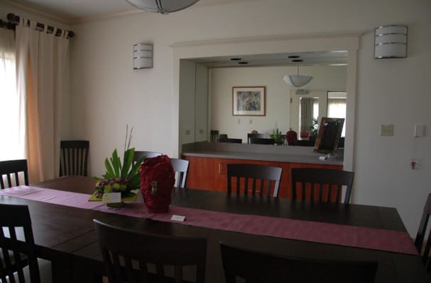 Bright dining room with a large table and decor