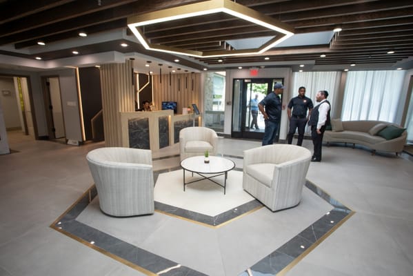 Modern lobby area with people interacting