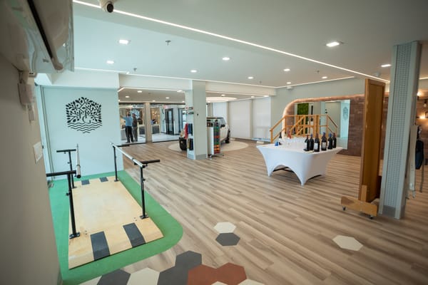 Interior view of a facility lobby with residents and amenities