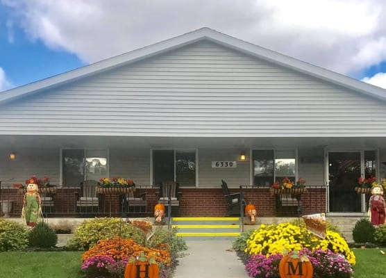 Exterior view of Havelock Manor decorated for fall