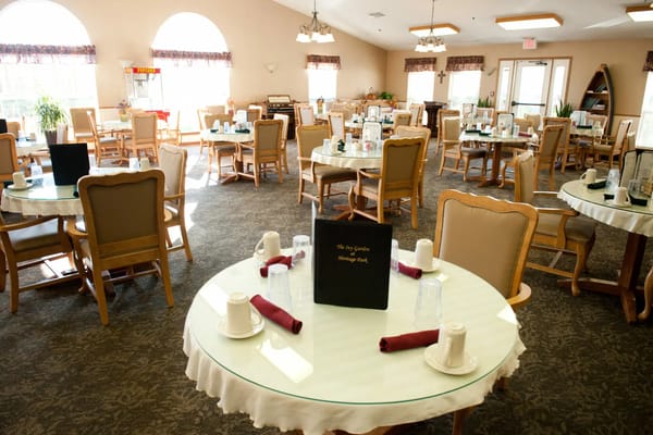 Well-set dining tables in the Heritage Park dining room