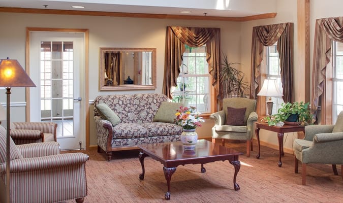 Inviting living room with floral couch and natural light
