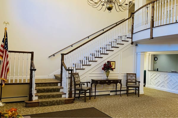 Interior lobby with staircase and seating area
