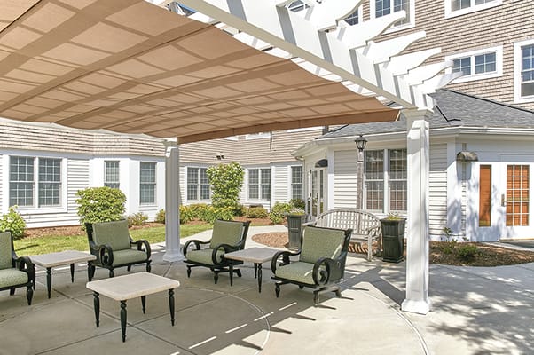 Outdoor seating area with shaded pergola