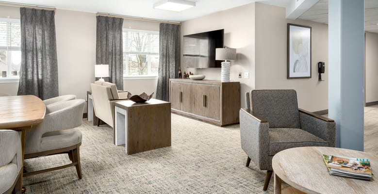 Bright and modern living room with comfortable seating and natural light.