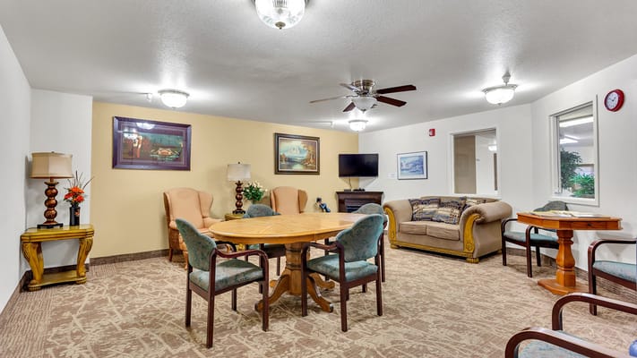 Cozy common area with seating and tables