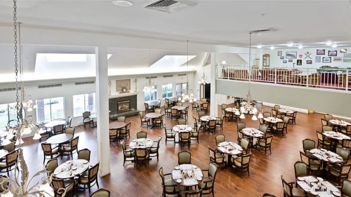 Dining area with tables and bright lighting