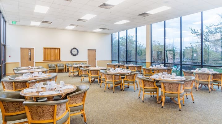 Dining area with tables set for a meal