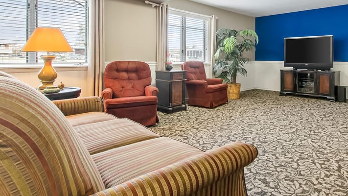 Cozy common area with seating and natural light