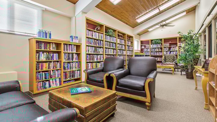 Interior library with bookshelves and seating