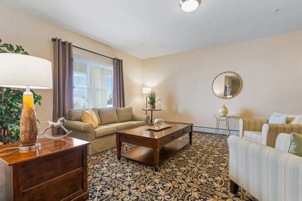 Bright common area with seating and decor