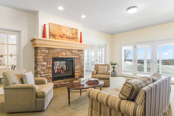 Cozy common area with comfortable seating and fireplace