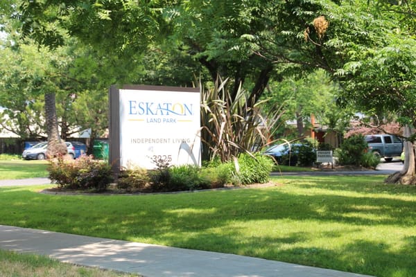 Signage for Eskaton Land Park with landscaping