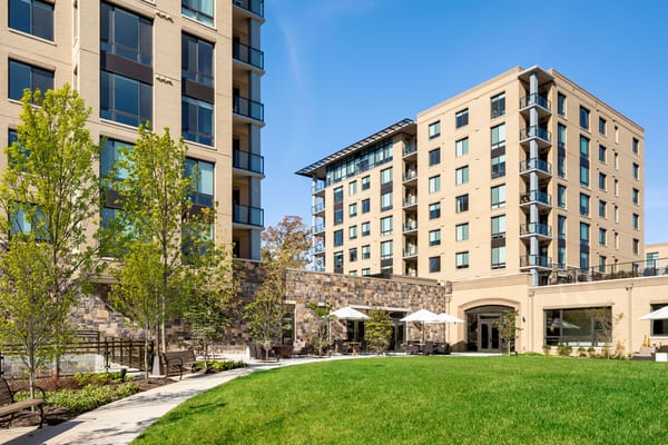 Exterior view of the living facility with landscaped grounds