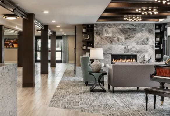 Interior common area with seating and fireplace