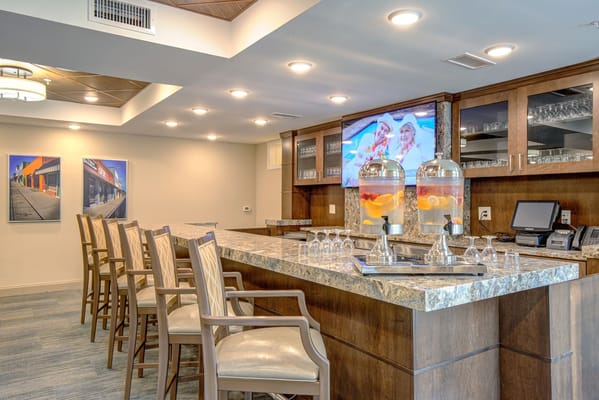 Interior view of a social gathering area with a bar