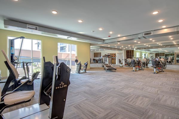 Interior view of a fitness center with exercise equipment