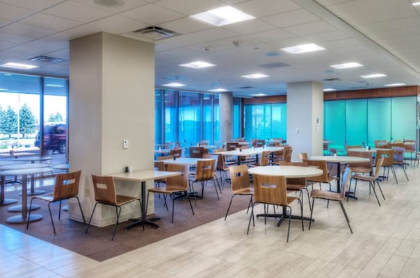 Bright dining room with tables and chairs