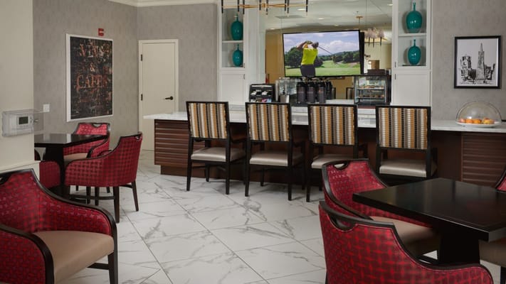 Cozy lounge area with seating and a television