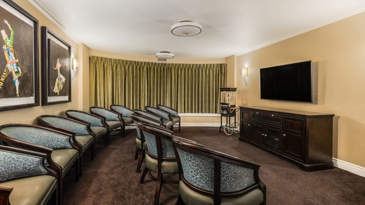 Interior waiting area with seating and television