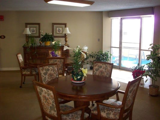 Cozy common area with floral decor and seating