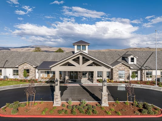 View of the entrance of Kiley Ranch senior living facility with landscaping