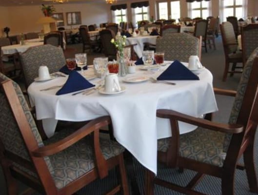 A well-set dining table in the dining room of Kindred Place at Harrisburg.