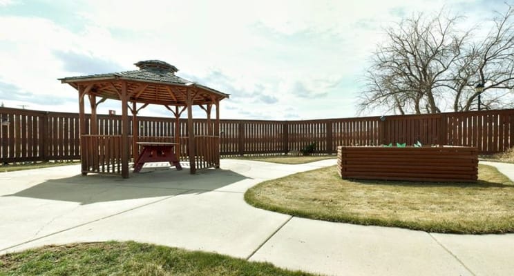 Outdoor gazebo in a landscaped area