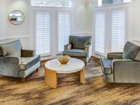 Cozy common area with chairs and a table