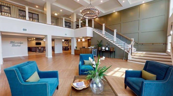 Bright and welcoming lobby area with seating and decor
