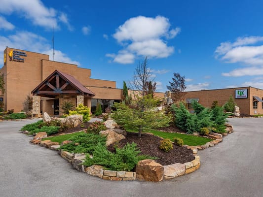 Exterior view of Liberty Park Senior Living with landscaped area