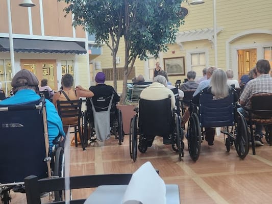 Residents attending an activity in the common area