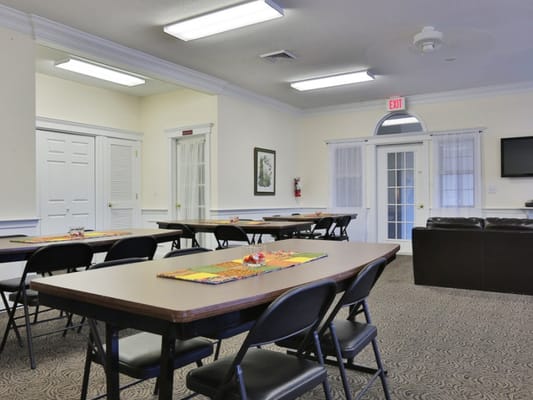Interior view of a dining area with tables and chairs