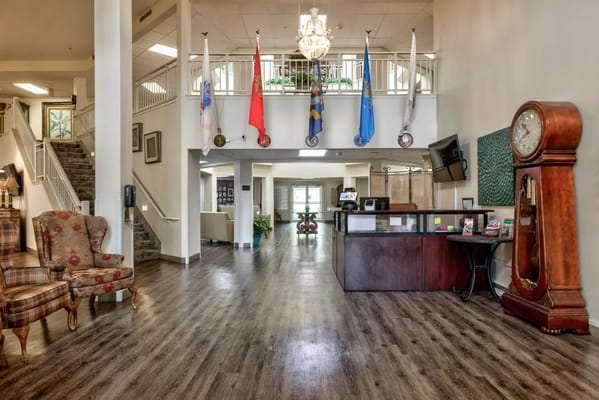 Lively interior of a senior living facility lobby