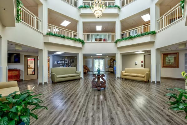 Interior view of a bright common area with seating