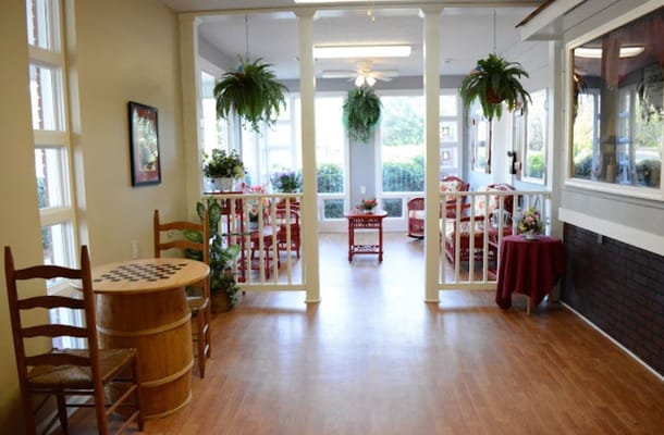 Bright common area with seating and plants