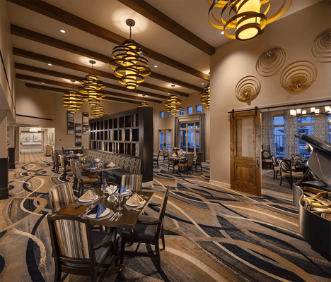 Elegant dining room with stylish lighting and decor