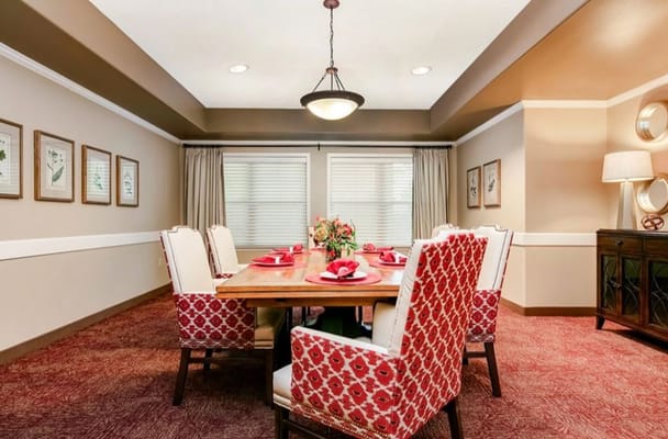 Dining room with ornate table settings