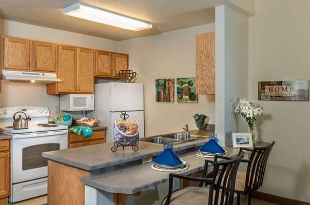 Bright kitchen area with modern decor and appliances