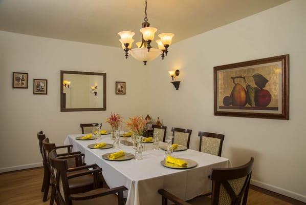 A dining room setup with a beautifully arranged table