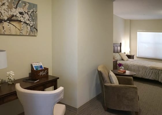 Interior view of a resident room with a sitting area
