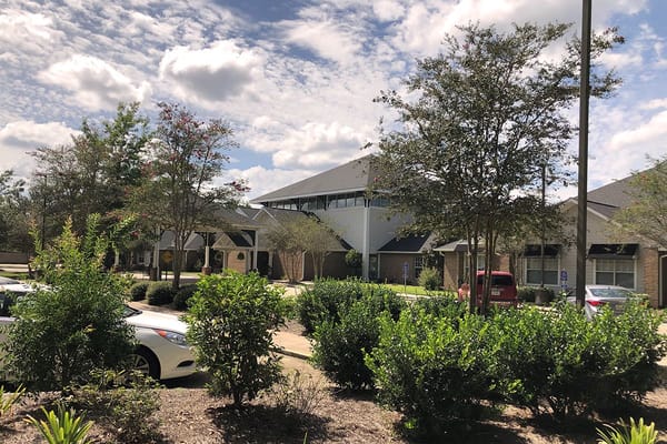 Exterior view of Oak Park Village with landscaping