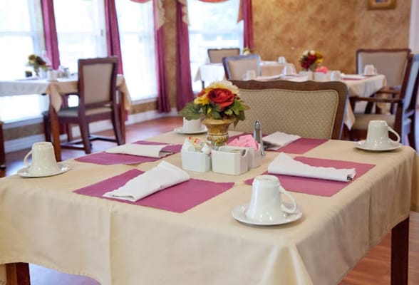 Dining room table set for a meal